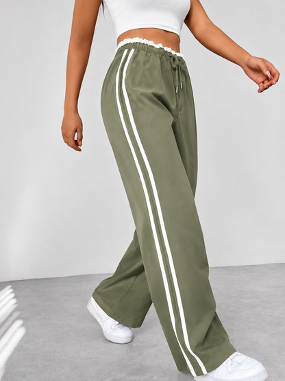 Sofía | Pantalones Deportivos de Talle Alto para Mujer con Rayas Blancas y Cintura Elástica 4