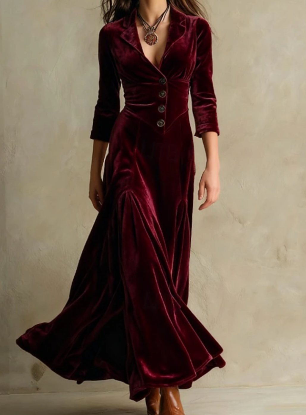 Detalle del cuerpo con botones y manga 3/4 del vestido maxi elegante