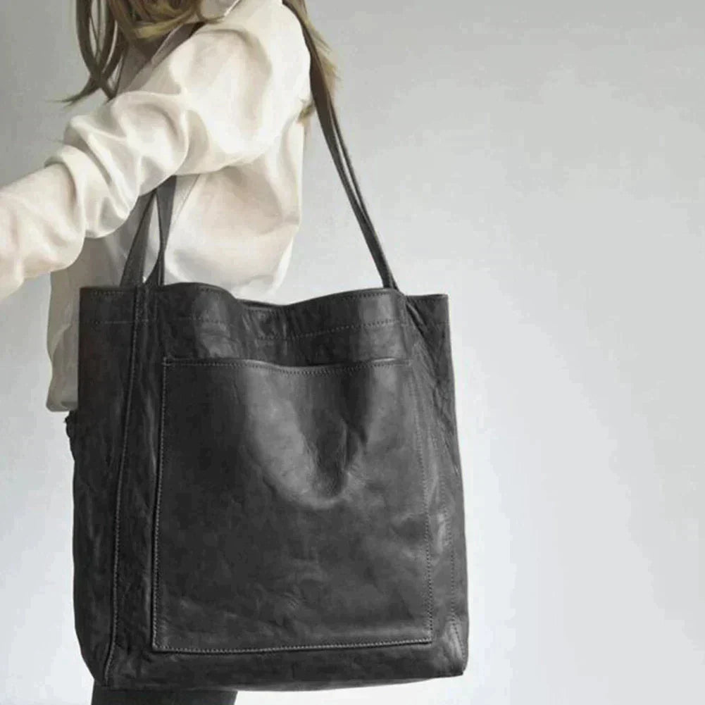 Bolso AMARELLE con correa ajustable para llevar al hombro