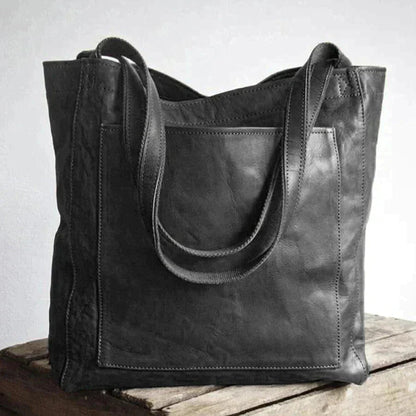 Bolso AMARELLE en color burdeos con acabado sofisticado