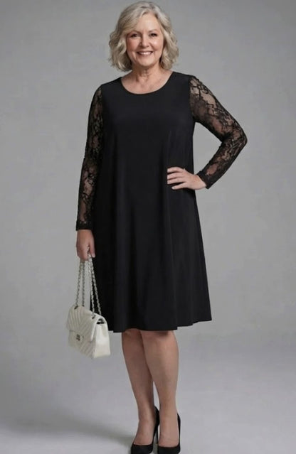 Detalle del peplum en la cintura del vestido midi AMELIA