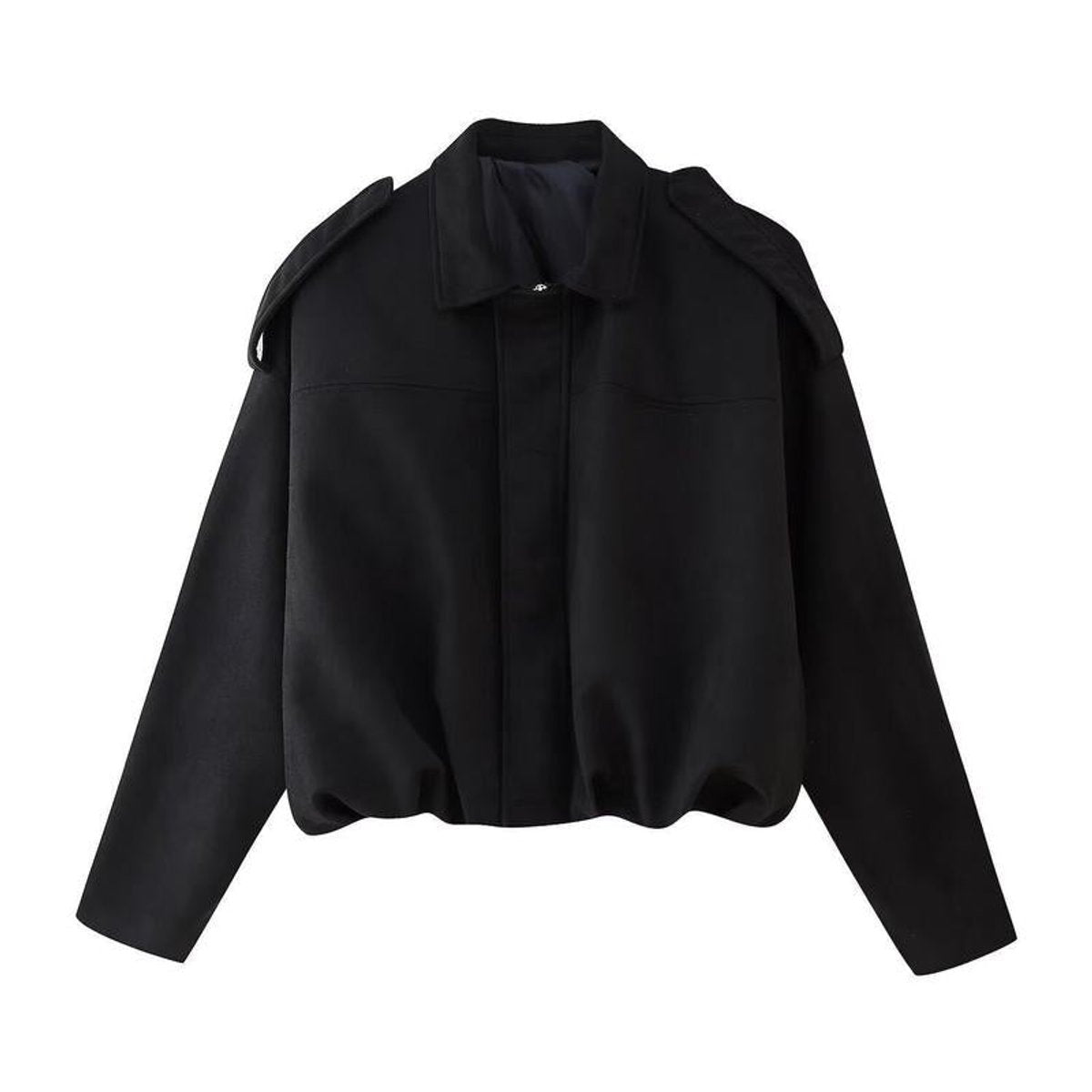 Cazadora bomber oversized combinada con look casual diario
