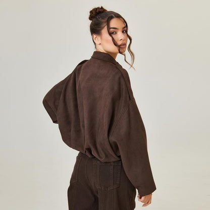 Detalle de bolsillos de la cazadora bomber oversized