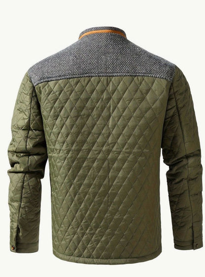 Vista frontal de la chaqueta acolchada bicolor con paneles de punto en los hombros