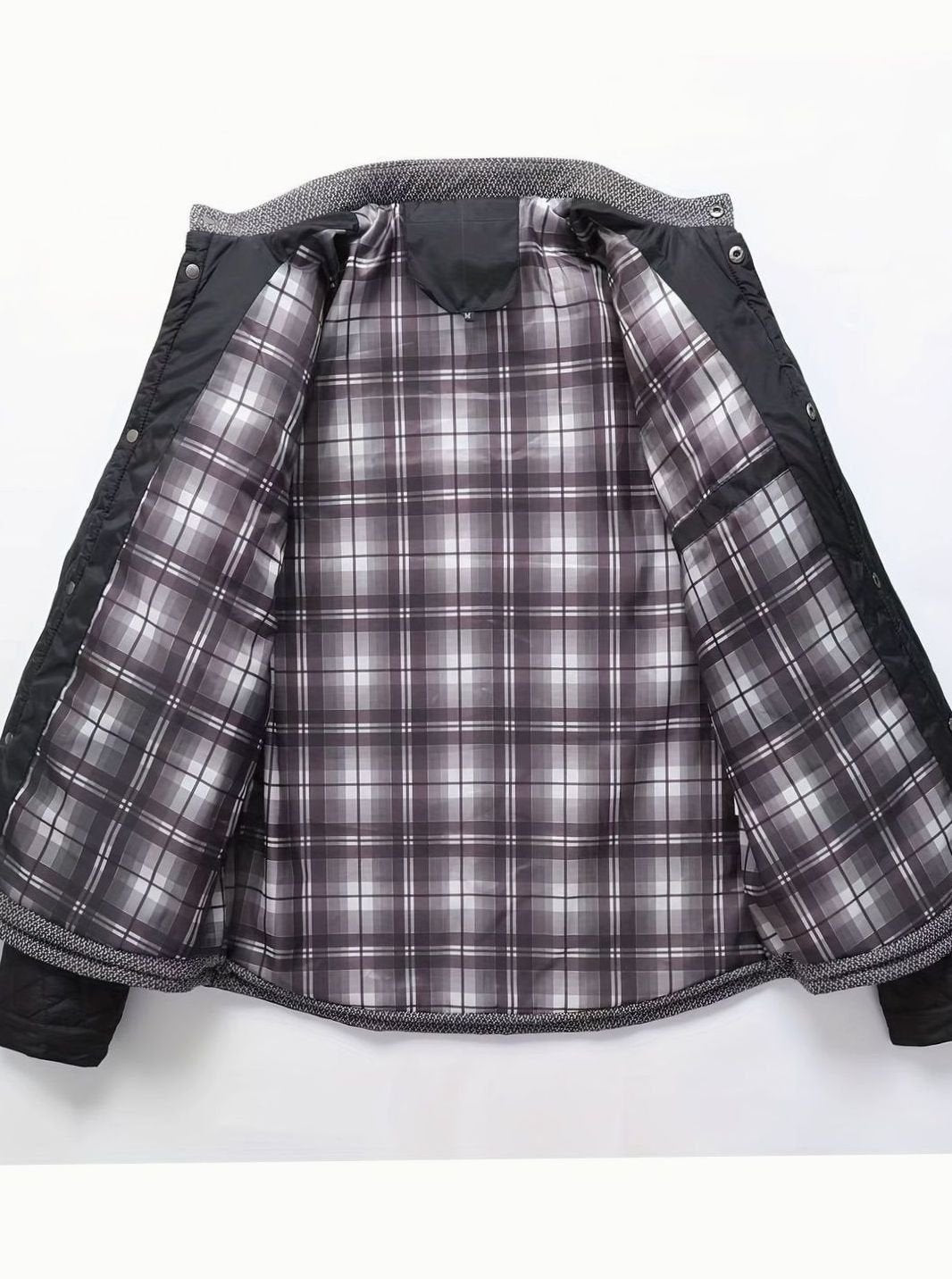 Vista trasera de la chaqueta acolchada con diseño bicolor