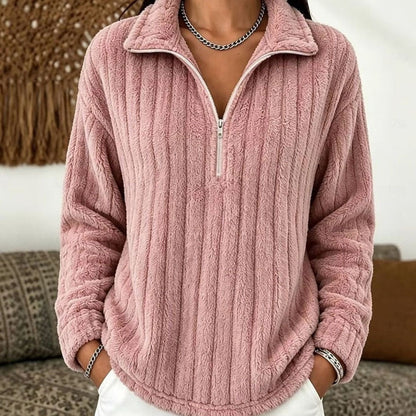 Detalle del cuello con cremallera ajustable del jersey BRIMZO