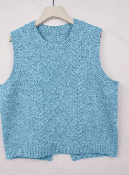 Chaleco de punto combinado con jeans para look casual