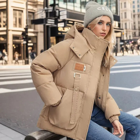 Mujer con abrigo de nieve BRINELLE impermeable en color negro