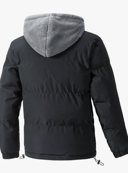 Chaqueta acolchada con cremallera completa y capucha, ideal para el frío urbano