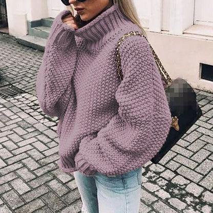 Detalle de las mangas y silueta holgada del jersey oversize