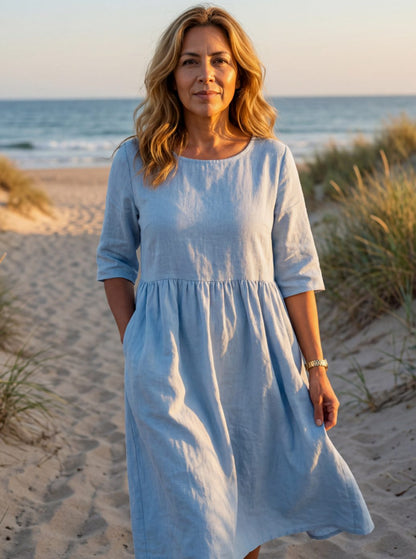 Vestido midi de lino azul con cuello redondo y manga media