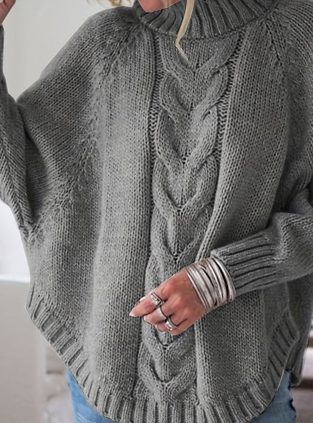 Jersey oversize combinado con vaqueros para look casual