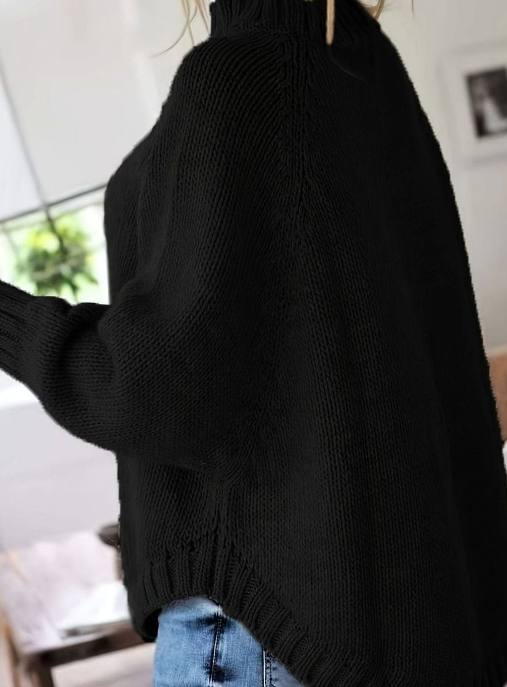 Jersey oversize en color gris oscuro con cuello alto