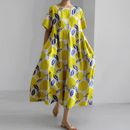 Vestido midi floral con cuello redondo y manga corta