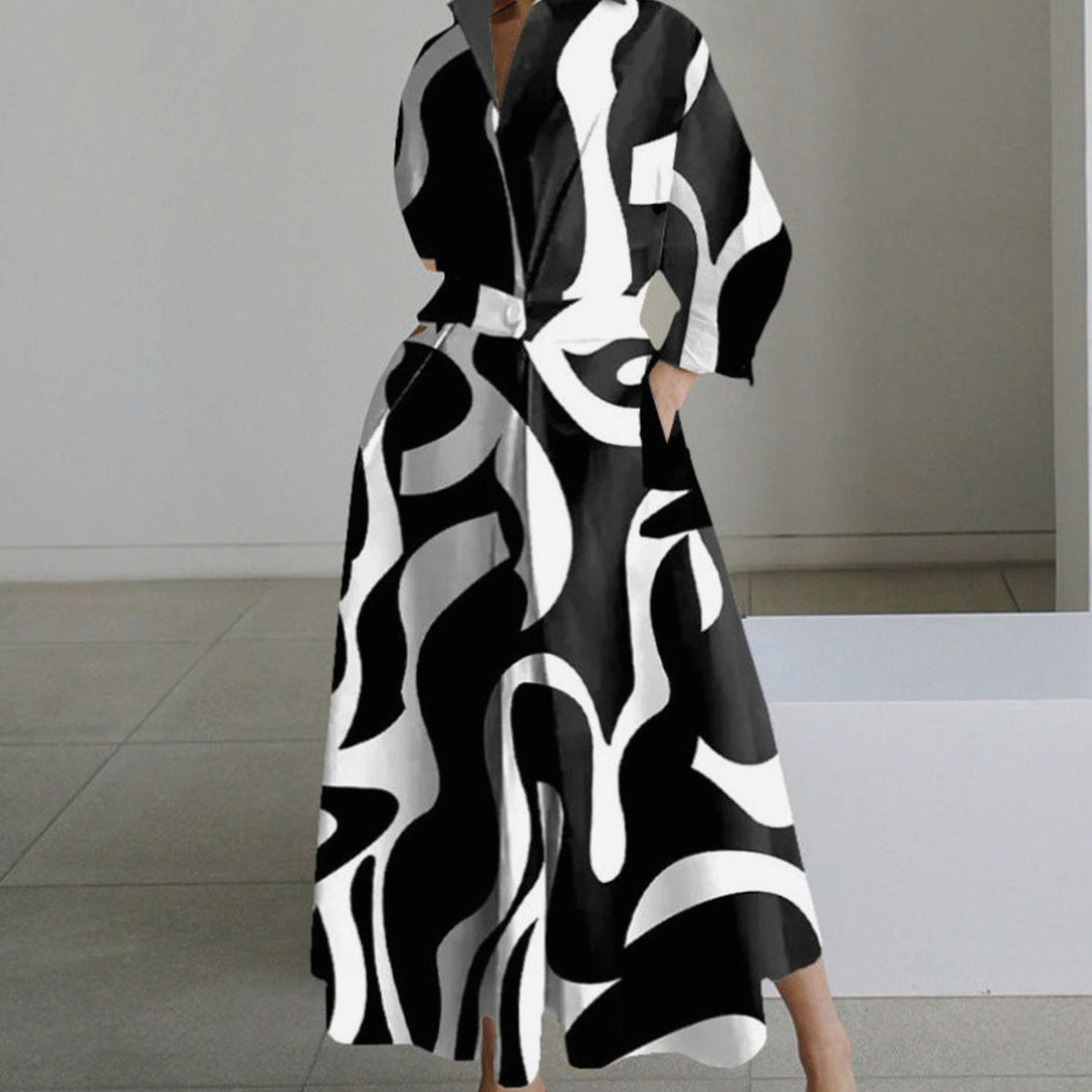 Vestido largo de mujer con estampado y silueta fluida en movimiento
