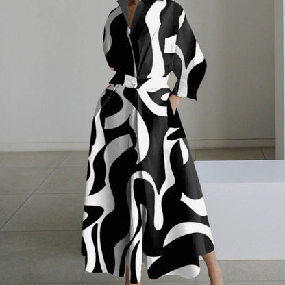 Vestido largo de mujer con estampado y silueta fluida en movimiento