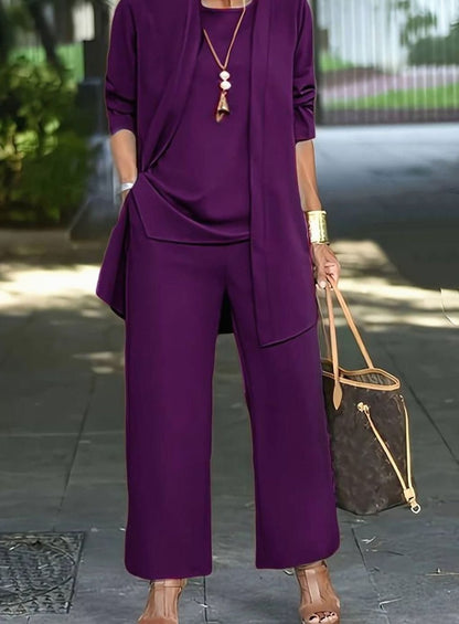 Mujer con conjunto de pantalón ancho y cárdigan abierto en look casual
