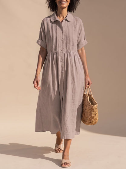 Vestido midi de algodón usado como cover-up de playa