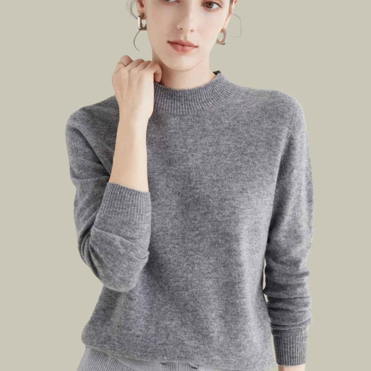 Jersey MERINELLE bajo una blazer para look formal
