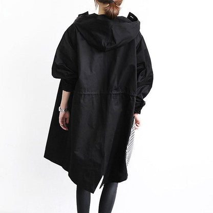 Abrigo oversize en color negro con botones frontales