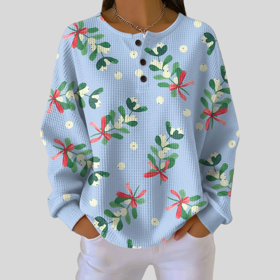 Sudadera navideña NOELLE con estampado de muérdago y cuello de botones