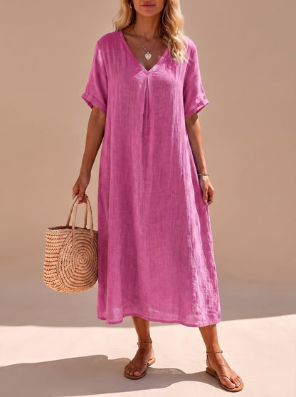 Vestido maxi SANTORA combinado con sandalias planas para look de vacaciones