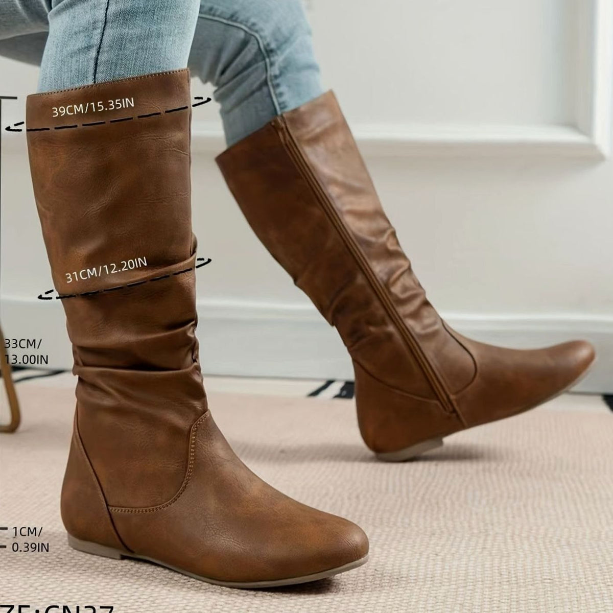 Botas planas mujer combinadas con vaqueros pitillo