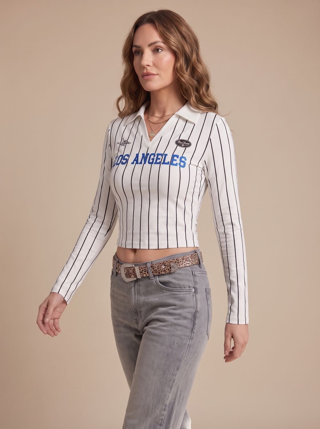 Top de mujer en azul oscuro con estampado de rayas
