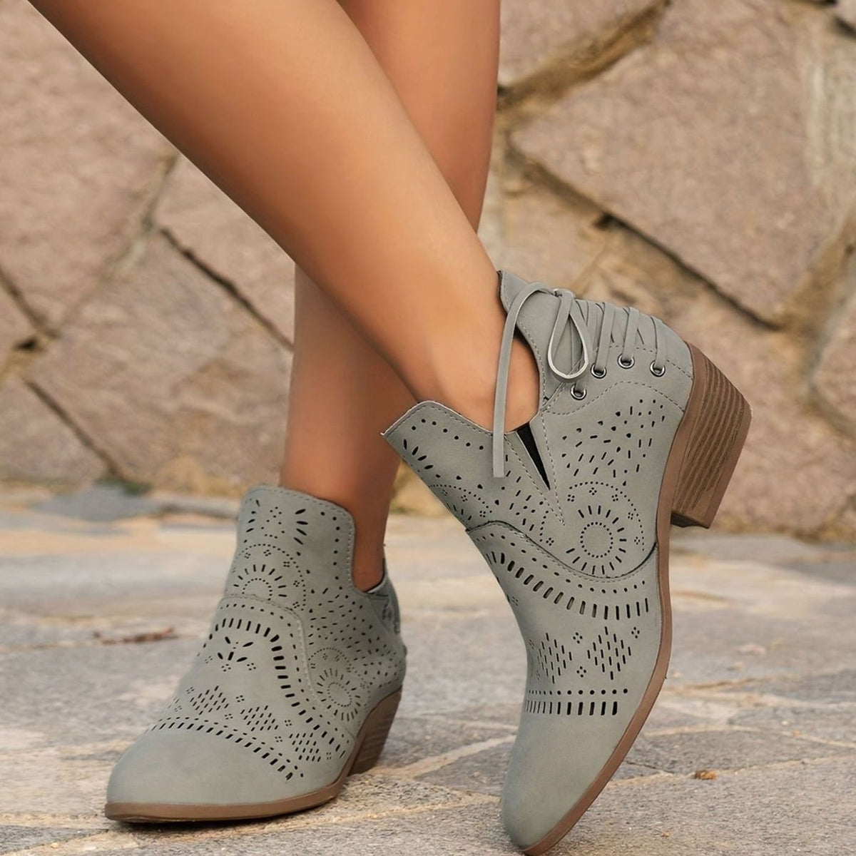 Botines TALYX en color gris con acabado elegante