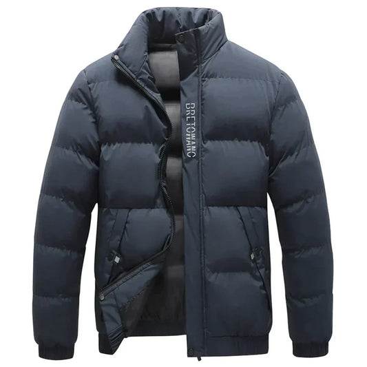 Hombre con abrigo de invierno impermeable y cortavientos THOR en color azul oscuro