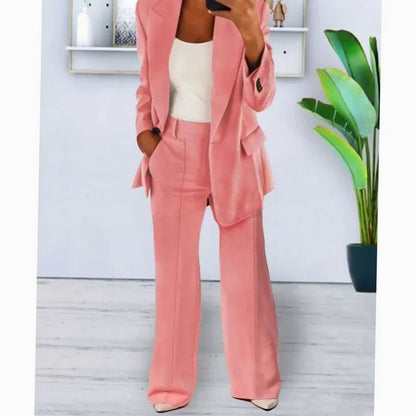 Vista trasera del conjunto de blazer y pantalón ancho de mujer