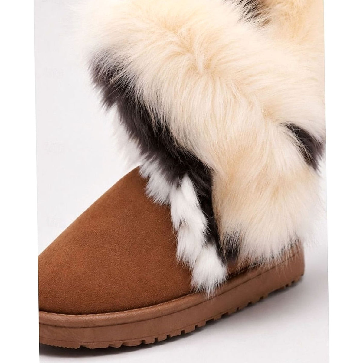 Botas de YULANI YULANI combinadas con vaqueros para look invernal